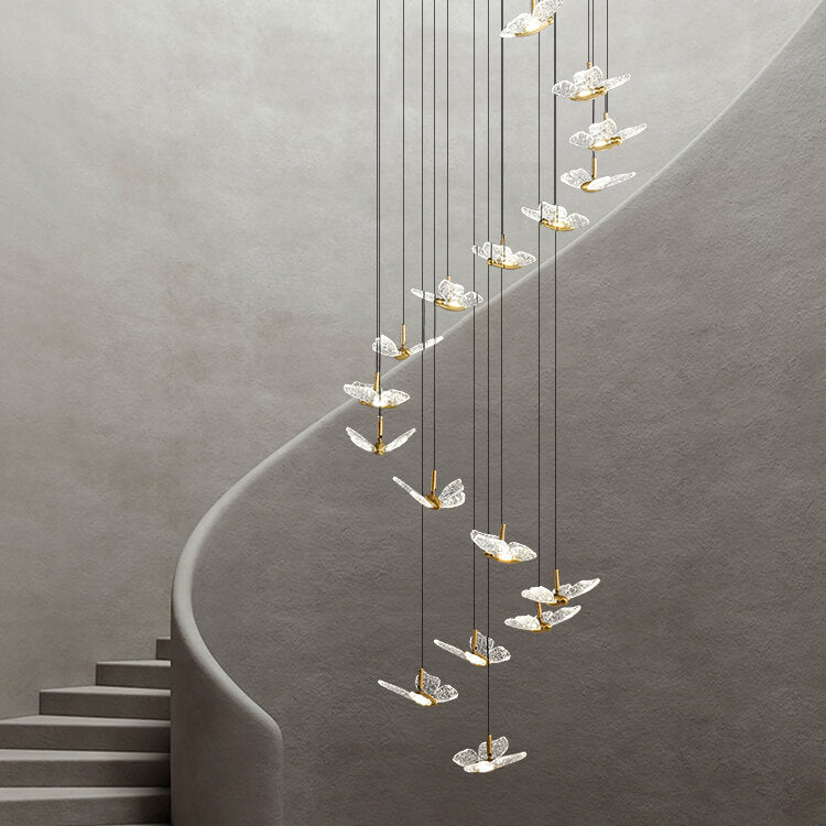 spiral smoke grey crystal butterfly pendant lighting hanging from the ceiling in the staircase