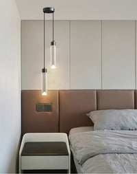 2-lights crystal cylinder pendant light besides bed