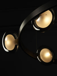 three black glass ball lampshades