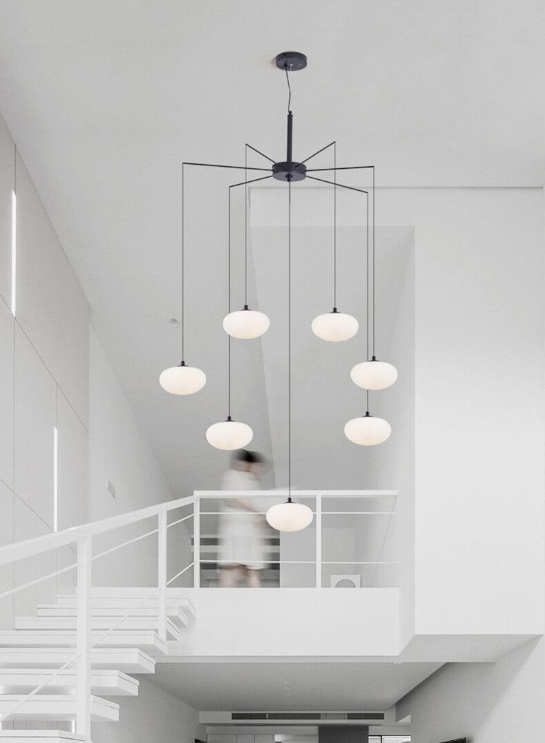 multi milk ball chandelier in Nordic style is hanging for staircase