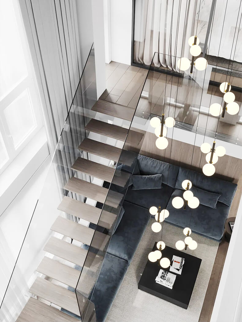 multi opal globe pendant lighting hanging besides the staircase