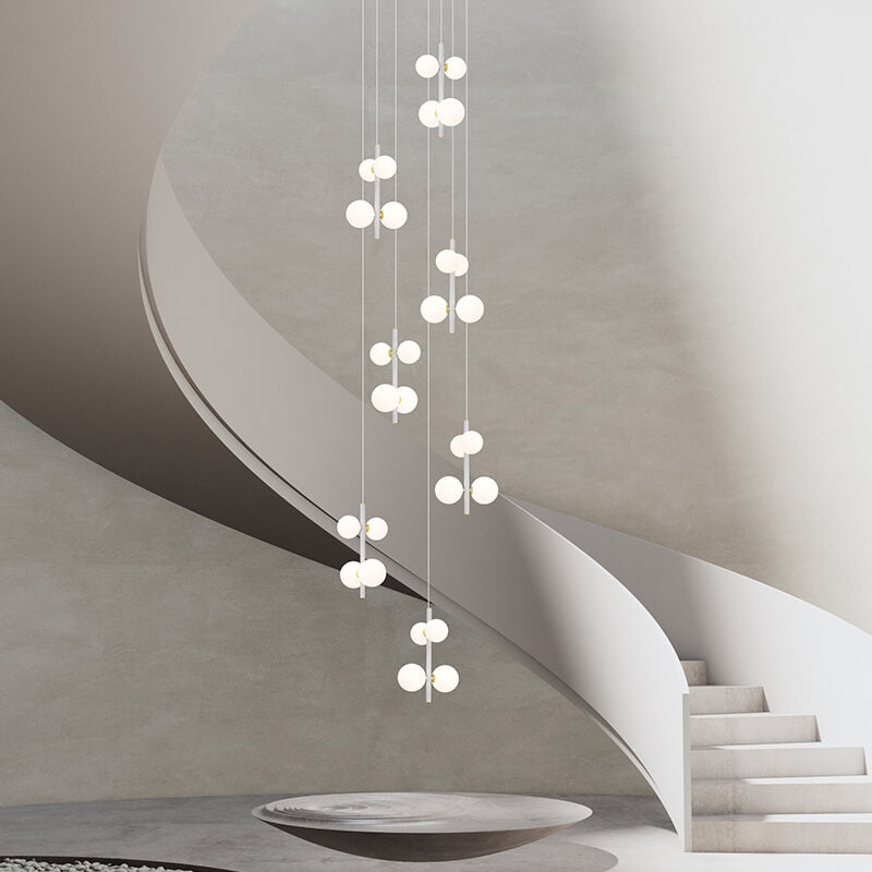 multi opal globe pendant lighting hanging in the spiral staircase