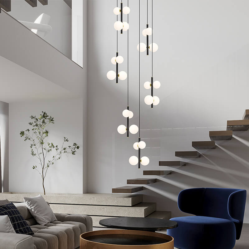 multi opal globe pendant lighting hanging over the round table in the living room