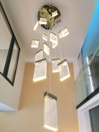 square crystal bubble pendant light hanging from ceiling