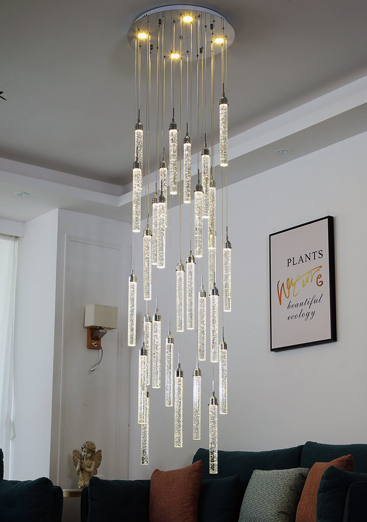 shining crystal bubble cylinder pendant light hanging from ceiling in the living room