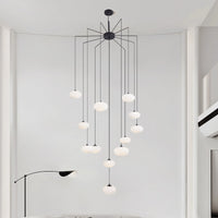 multi milk ball chandelier in Nordic style is hanging from ceiling in the living room